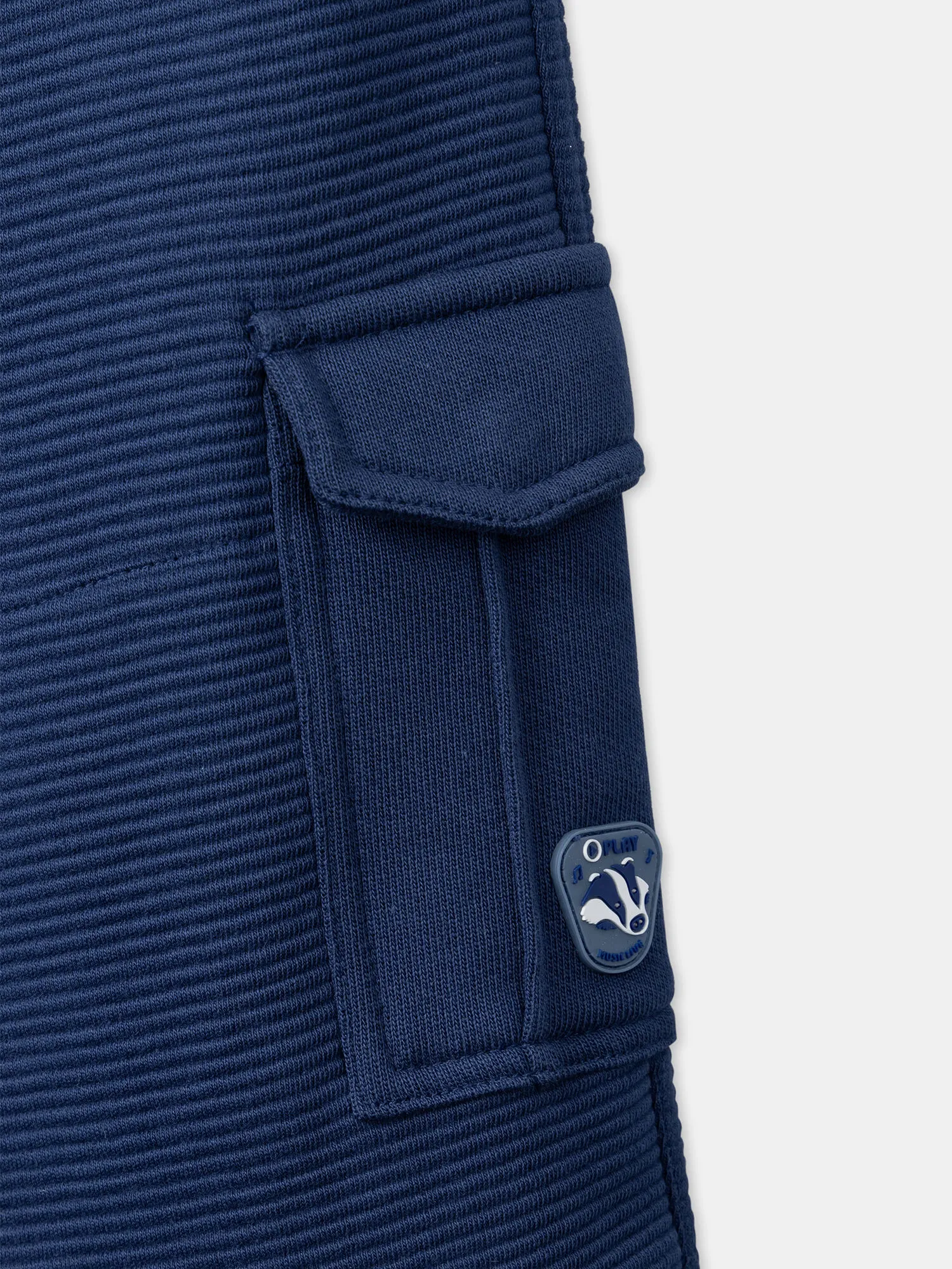 Pantalon bleu en maille fantaisie texturée