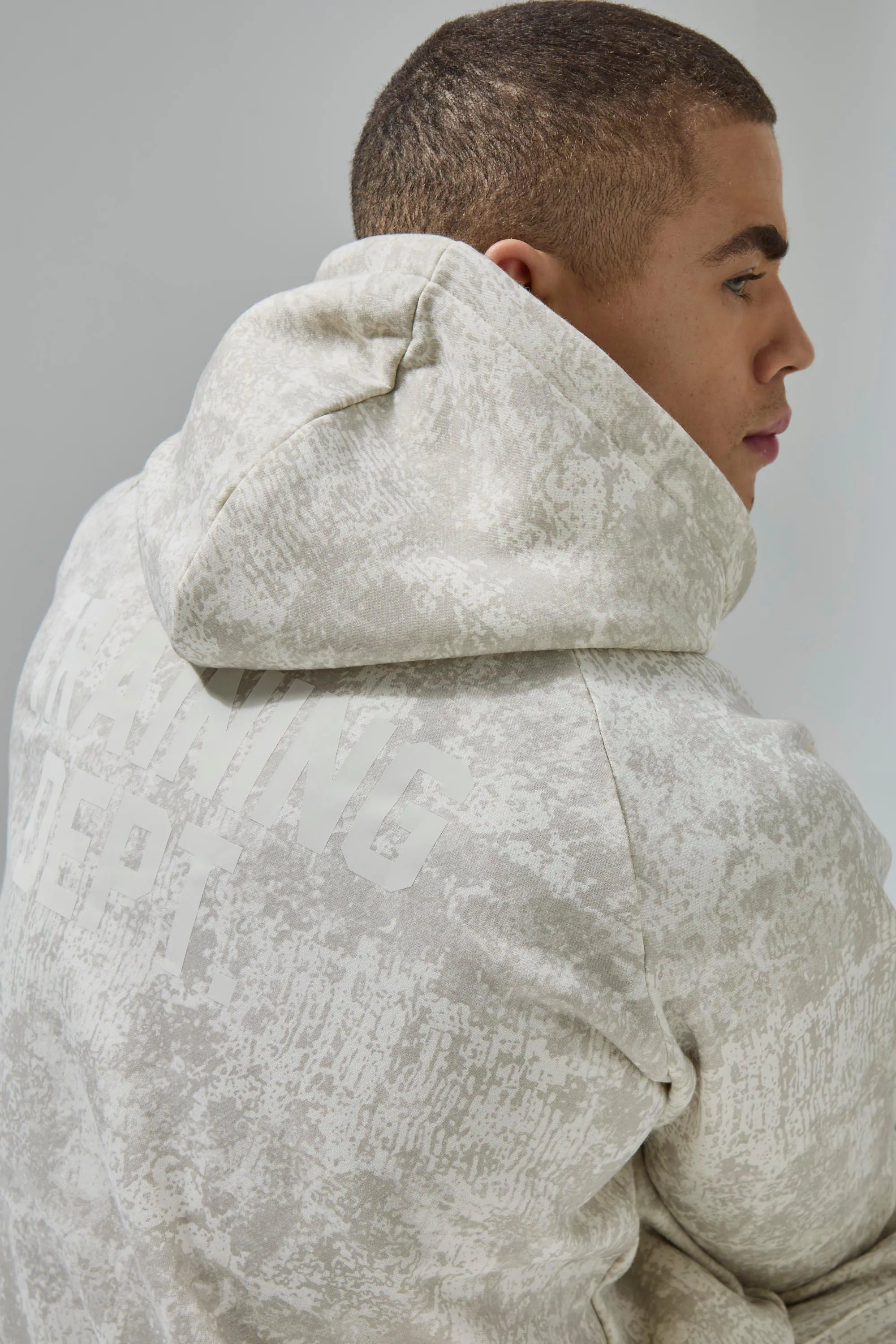 Sweat à capuche oversize à imprimé camouflage